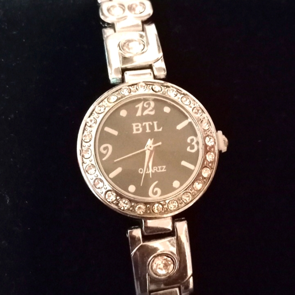 Silver tone watch